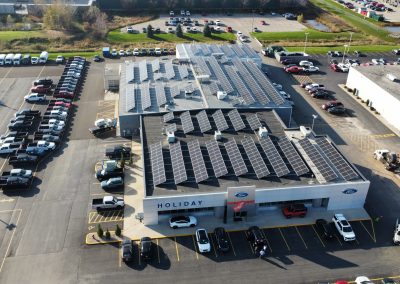 Holiday Automotive Installing Solar Arrays